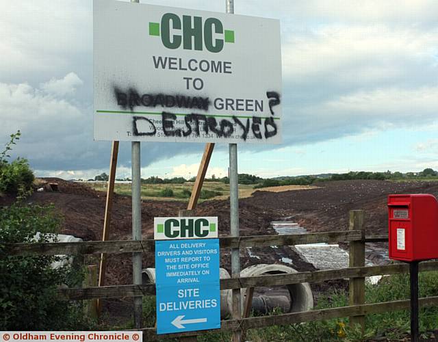 DEFACED . . . the entrance sign on the Foxdenton Lane development