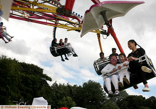 RIDING high . . . at the fairground