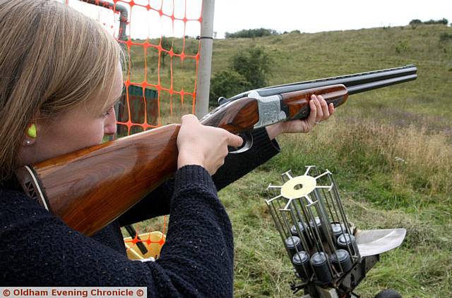 TAKING aim... Chronicle reporter Rosalyn Roden has a go at the charity clay pigeon shoot in aid of North West Air Ambulance