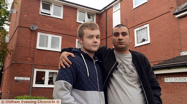 HEROES . . . Michael Murphy (left) and Kenny Sharp rescued an elderly neighbour from her flat in Durden Mews, Shaw, after her cooker caught fire