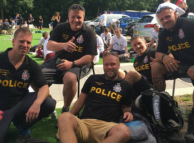 BRAVE shavers . . . Oldham police officers (from left) PCSO Tony Riley, Sgt Danny Atherton, PC Lee Aldcroft, PC Damieon Hartley-Pickles and PCSO Gary Carter
