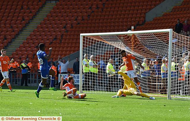 IT'S THERE: Darius Osei scores for Latics