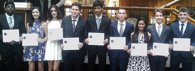 SPACE cadet . . . Ben Bardsley (second right) with fellow graduates of United Space School with their certificates