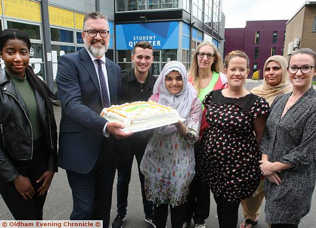 AGE is no barrier . . . front, from left, Judith, Oldham college principal, Alun Francis, Ume Habiba Ghulam, Carla Cordock, head of caring professions, Carly Unsworth, head of maths. Back, from left, James Bacon, Alison Burton, and Riaz Bibi