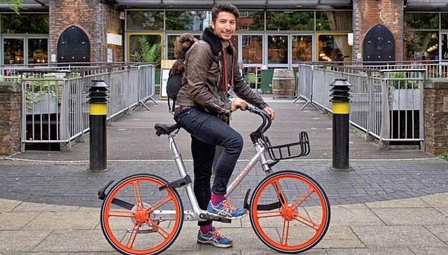 INNOVATIVE bike sharing scheme . . . one of the Mobikes being used around Manchester