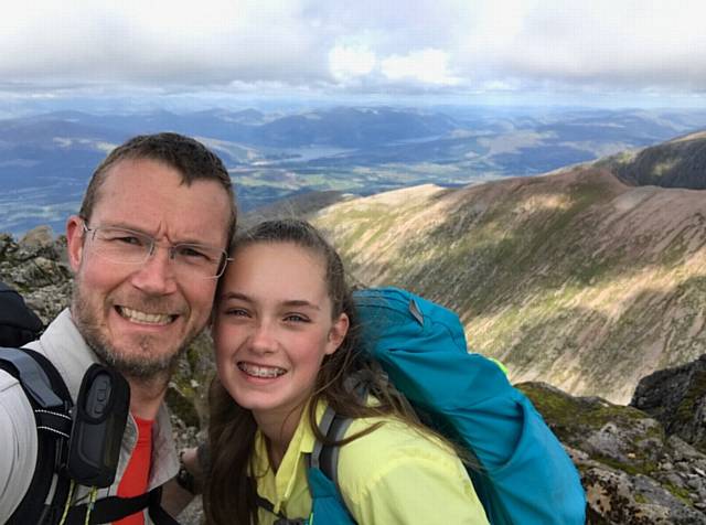 ON top of Scotland . . . Nick Parkin and daughter Bexi at Ben Nevis summit