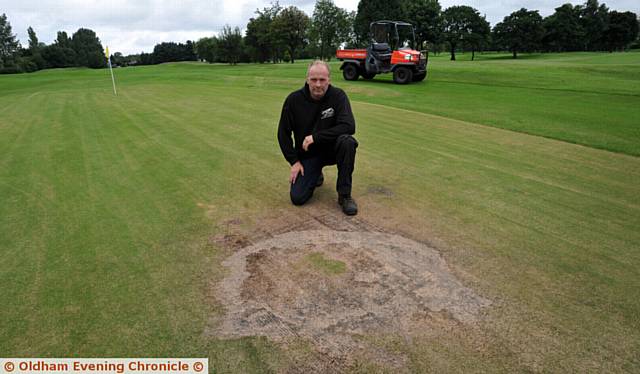 WERNETH Golf Club head greenkeeper Colin Worthington on the first green damaged by fire