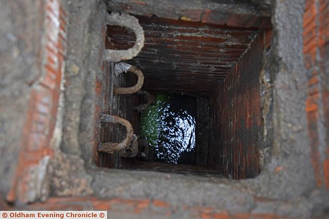 Sink hole on Acre Lane, Derker. Council workers establish it is likely to be a mains collapse and therefore United Utilities' responsibility.