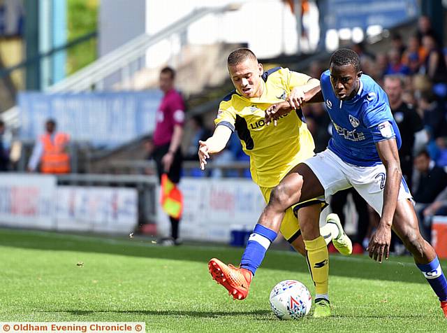 NOT THIS TIME . . . Ousmane Fane tries to beat his Oxford opponent