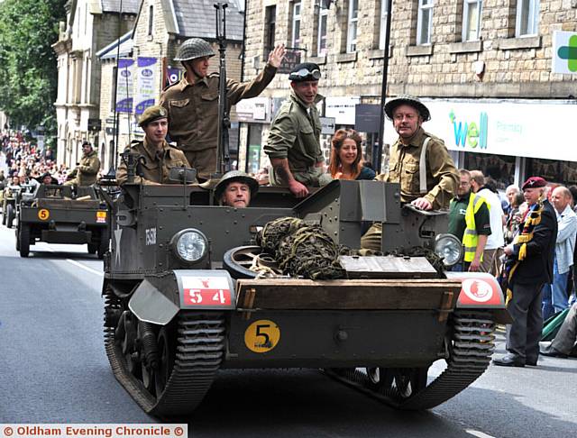 THE fabulous parade winds it way through Uppermill