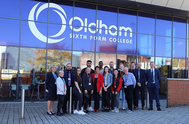 The Government’s Apprenticeships and Skills Minister Anne Milton (wearing a red jacket) with staff and students at the Oldham Sixth Form College