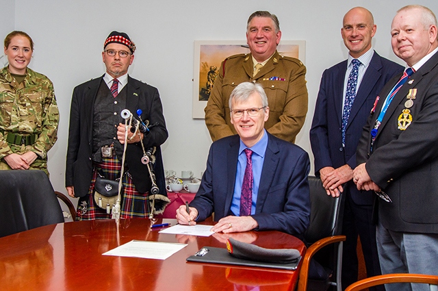 Sir David Dalton, chief executive of the Northern Care Alliance, signing the covenant