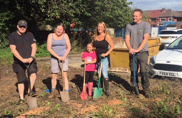 Katie Bowker with volunteers at Dexter’s Garden