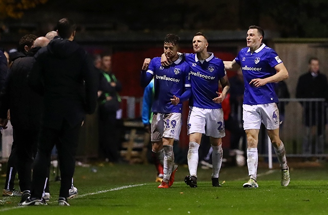 Get in: Athletic players celebrate their last-gasp victory