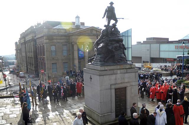 A past Remembrance Sunday scene at the Oldham War Memorial