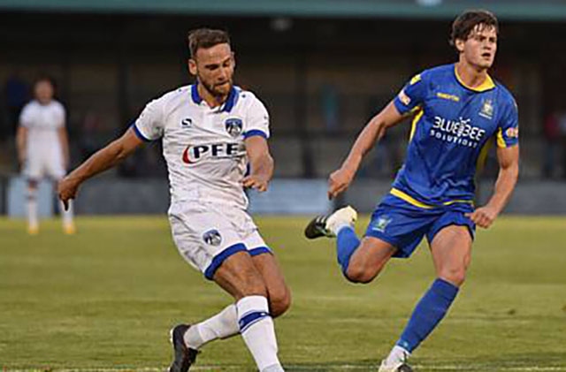 Athletic midfielder Dan Gardner (left) Athletic midfielder Dan Gardner (left)