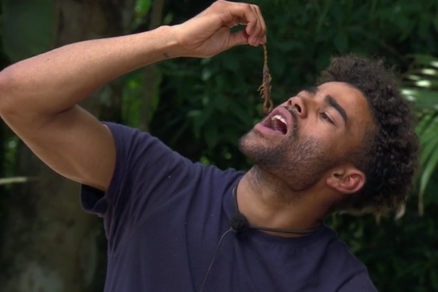 Oldham's Malique Thompson-Dwyer tries a tasty scorpion. Oldham's Malique Thompson-Dwyer tries a tasty scorpion.