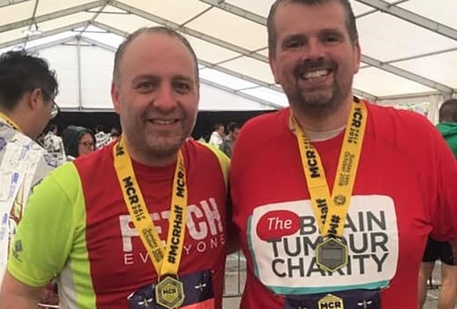 Andy (right) with Dr Nadhim Bayatti at the end of the Manchester Half Marathon