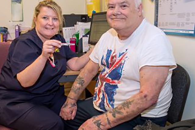 Irene Shepherd is pictured with pensioner David Ashley