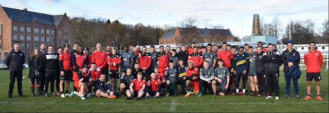 Hopwood Hall College students and Salford Red Devils staff and players line up Hopwood Hall College students and Salford Red Devils staff and players line up