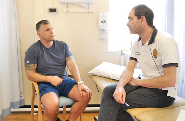 Barrie McDermott is pictured with Senior Physiotherapist Rob Conlon, who features in the videos