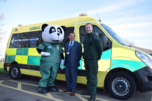 North West Ambulance Charity development manager, Vincent Sherard-Bornshin (centre), with Pandamedic (left) and David McNally, Community Engagement and Resuscitation Manager at North West Ambulance Service