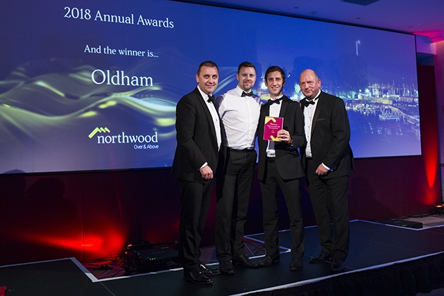 Northwood Oldham's Mike Procter (second right) receives his award