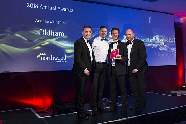 Northwood Oldham's Mike Procter (second right) receives his award Northwood Oldham's Mike Procter (second right) receives his award