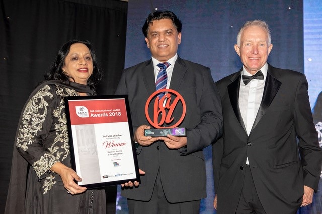 Oldham's Dr Zahid Chauhan (centre) receives his Homeless Friendly award Oldham's Dr Zahid Chauhan (centre) receives his Homeless Friendly award