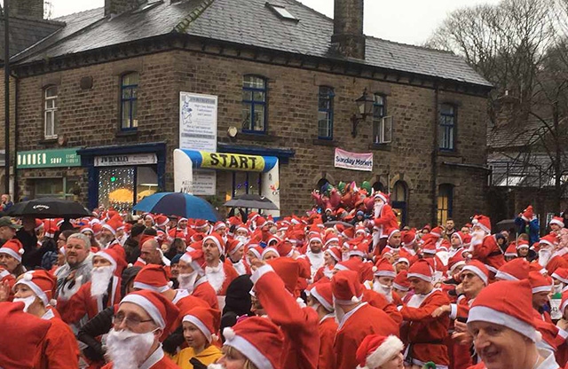 Runners at the Santa Dash in Uppermill