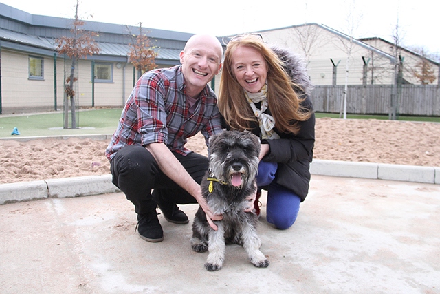 Sally Ann and Adam are pictured with miniature Schnauzer, Paddy