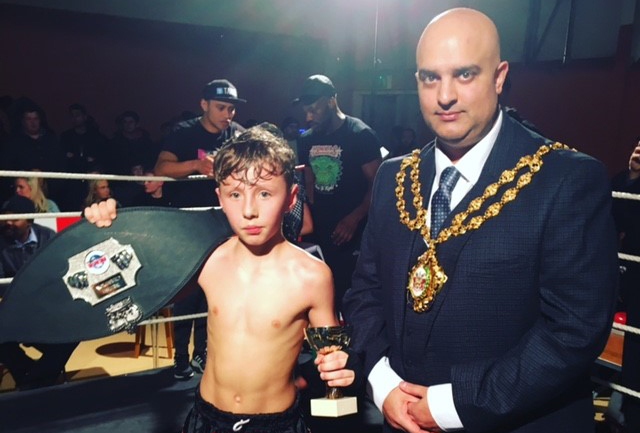 Tommy Lowe celebrates his British title win with Mayor of Oldham, Cllr Shadab Qumer