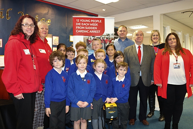 Whitegate End Primary School’s School Council (front) pictured with (from left to right); Emma Short and Lesley Appleton from Hand on Heart, Cllr Chris Goodwin, Cllr Graham Shuttleworth, Elaine Owens and Joanne Draper (both from Whitegate End Primary School).