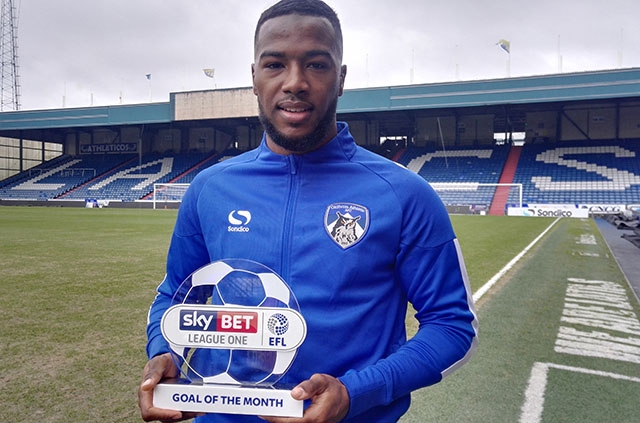 EFL Goal of the Month winner Duckens Nazon proudly shows off his award EFL Goal of the Month winner Duckens Nazon proudly shows off his award