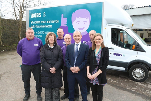 Pictured are (l-r): Councillor Barbara Brownridge, Cabinet Member for Neighbourhoods & Co-operative, Mick Hart, Bulky Bob’s Operations Manager, and Rosie Barker,  Support & Development Manager, Oldham Council Waste Management, in front of the Bulky Bob’s Oldham team.