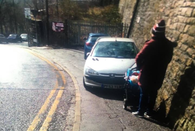 A post from the GMP Saddleworth and Lees Facebook page included a picture of a woman with a pram struggling to pass a parked car near Greenfield station A post from the GMP Saddleworth and Lees Facebook page included a picture of a woman with a pram struggling to pass a parked car near Greenfield station