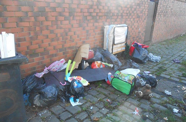 Fly-tipping waste to the rear of Mayfield Road in Oldham