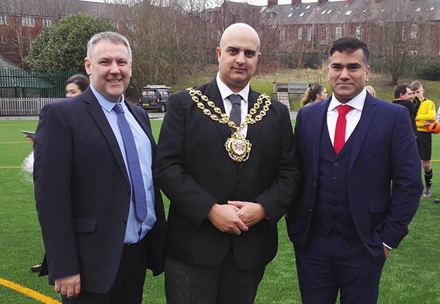 The Mayor of Oldham, Cllr Shadab Qumer, is flanked by John Padley (Head of Academy, left) and Sajhen Bakht (Vice Chair, Harmony Trust)