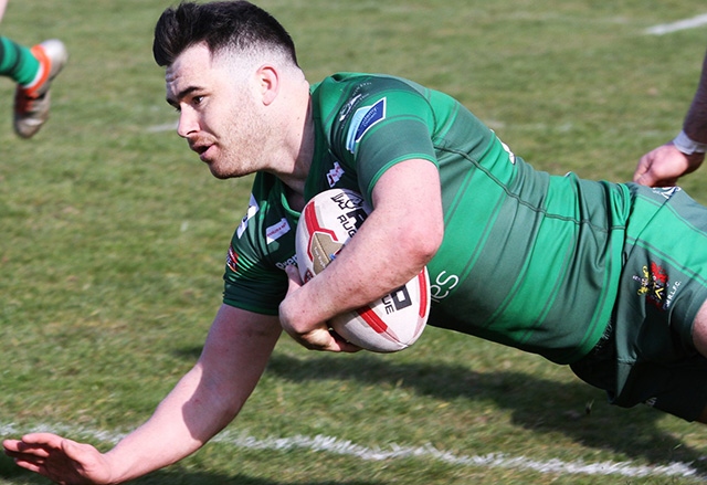 Oldham's Zack McComb dives over to score.

Picture courtesy of Dave Naylor