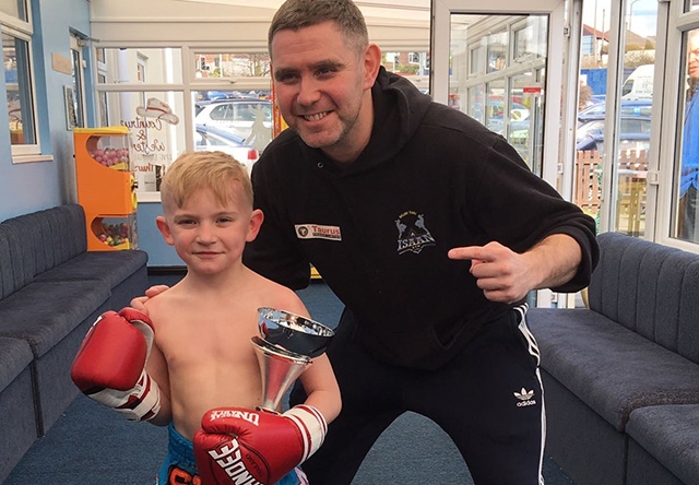 Thai boxing prospect Adam Parry with his trainer Steve Donnelly