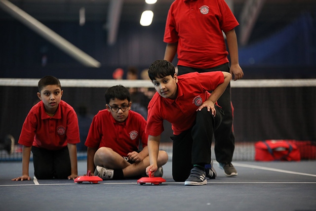 Radclyffe School players take part in the new age kurling event