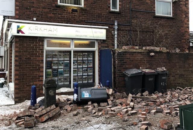 A wall fell down at the side of the Alan Kirkham estate agents' office in Royton