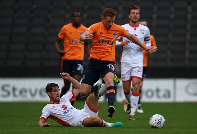 Eoin Doyle (centre) returned to action with a vital goal at Scunthorpe Eoin Doyle (centre) returned to action with a vital goal at Scunthorpe