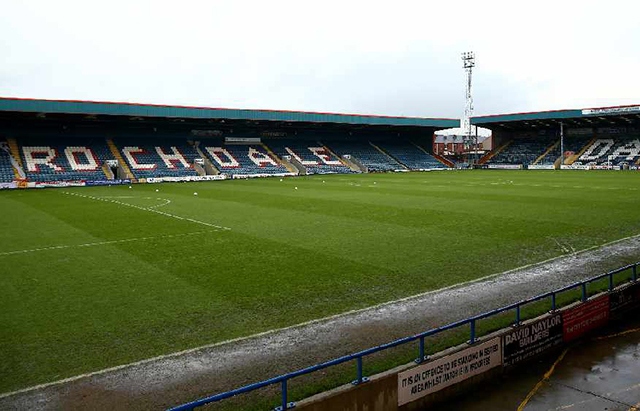 A fan has been arrested after running on to the pitch during Athletic's goalless draw at Rochdale's Crown Oil Arena