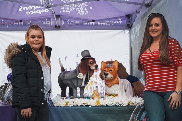 Thirteen-year-old Olivia Benn with a special cake made by Extreme Cake Maker Molly Robbins