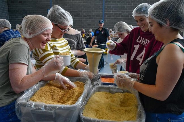 A scene from last year's Rotary Club Meal Pack