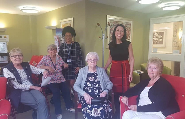 MP Debbie Abrahams with staff and residents at Springlees Court in Springhead