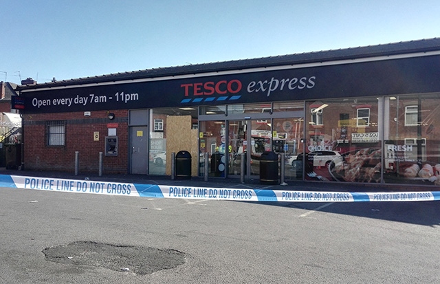 The scene at Tesco Express on Ashton Road this morning