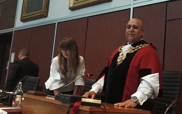 So proud: Cllr Javid Iqbal shows off his chains of office