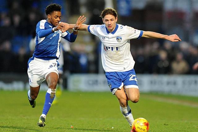 Athletic's versatile defender Rob Hunt (right)